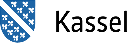 Logo of the City of Kassel, consisting of the blue city coat of arms featuring 13 white cloverleaves separated by a white diagonal bar. The word "Kassel" appears next to it.